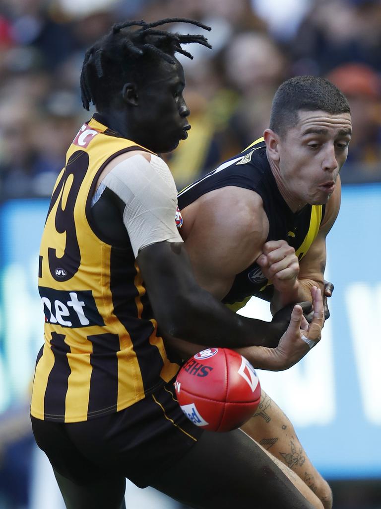 Changkuoth Jiath tackles Jason Castagna. (Photo by Darrian Traynor/Getty Images)