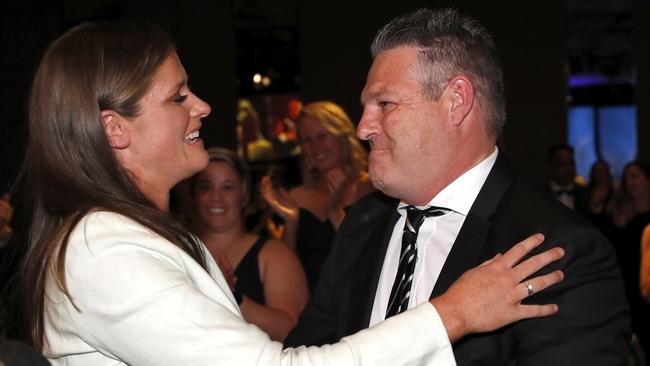 Davey is congratulated by Magpies coach Steve Symonds. Picture: AFL Photos via Getty Images