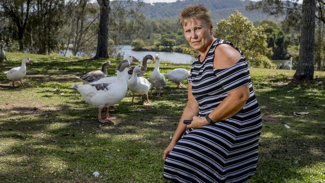 Unhappy resident Laura Szkoruda with some of the geese council want to get rid of. Picture: Jerad Williams