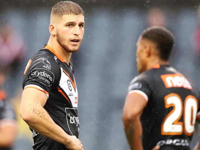 SYDNEY, AUSTRALIA - MARCH 21: Adam Doueihi of the Wests Tigers looks dejected during the round two NRL match between the Wests Tigers and the Sydney Roosters at Campbelltown Sports Stadium, on March 21, 2021, in Sydney, Australia. (Photo by Mark Kolbe/Getty Images)