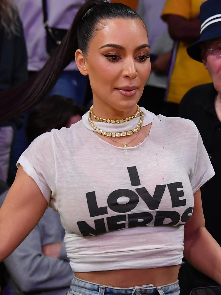 Kim Kardashian walks off the court. Photo by Allen Berezovsky/Getty Images.