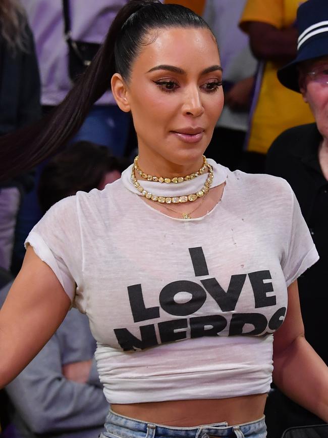 Kim Kardashian walks off the court. Photo by Allen Berezovsky/Getty Images.