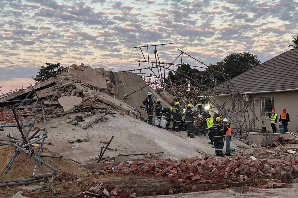 Rescuers search for survivors in deadly S.Africa building collapse ...