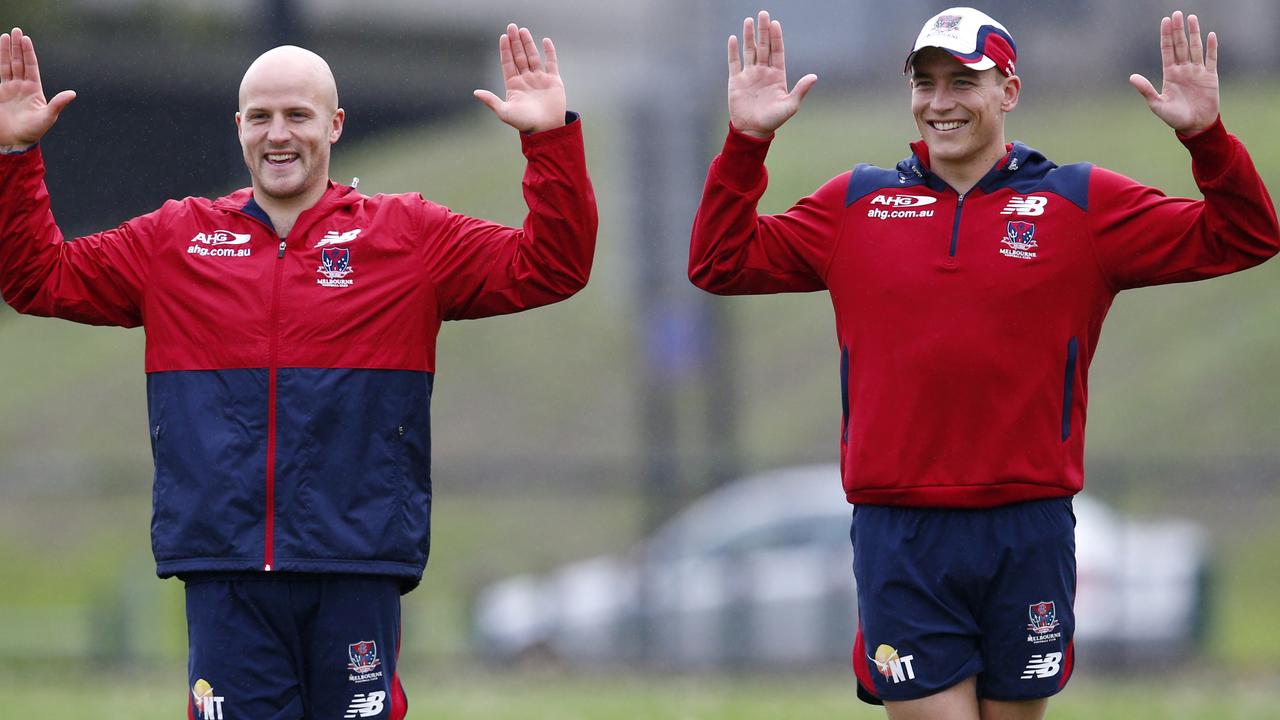 Melbourne training at Goschs Paddock. Skipper Nathan Jones and Bernie Vince during a handball drill . Pic: Michael Klein. Monday May 5, 2014.