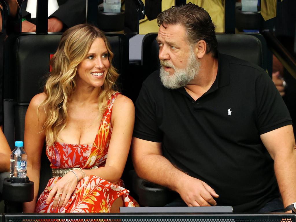 Russell Crowe and Britney Theriot watch the women’s final at the Australian Open. Picture: Mark Stewart