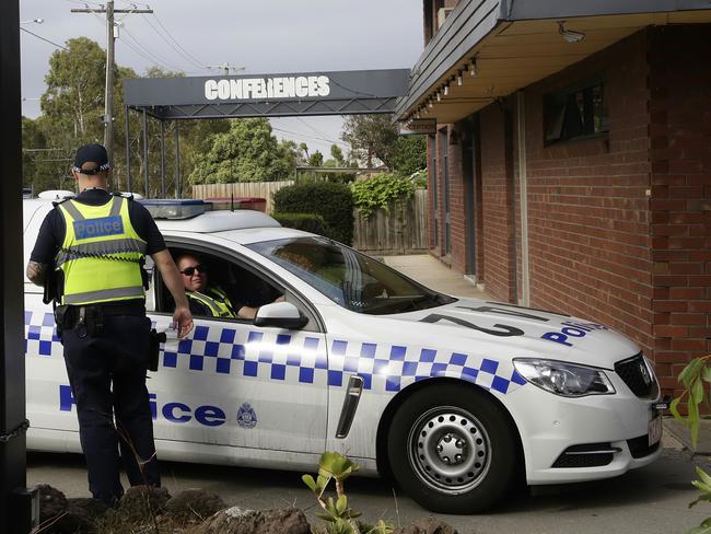 Police at the motel following the fatal shooting. Picture: Hamish Blair