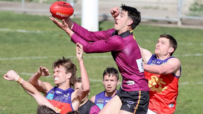 Noah Gown of Old Haileybury takes a mark. Picture: George Salpigtidis