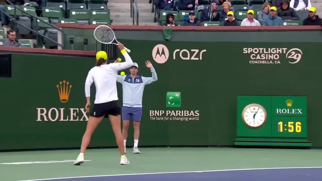 Tennis hothead hits ball at ball boy