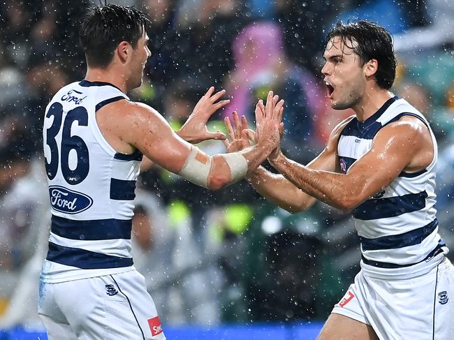 BRISBANE, AUSTRALIA - APRIL 20: Jack Bowes of the Cats celebrates kicking a goal during the round nine AFL match between Brisbane Lions and Geelong Cats at The Gabba, on April 20, 2024, in Brisbane, Australia. (Photo by Albert Perez/AFL Photos via Getty Images)