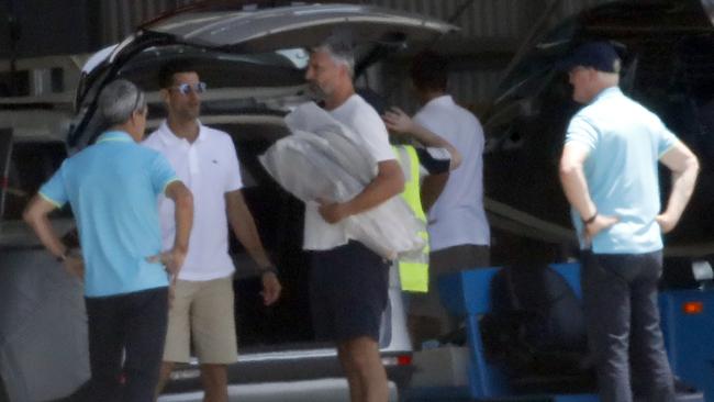 Novak Djokovic arrived at Melbourne's Essendon Airport on a private jet, flying in from Adelaide, with his entourage. Picture: Media-Mode