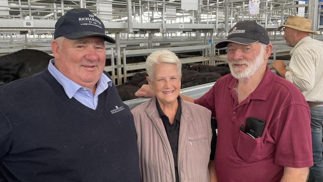 Peter and Gloria Walker sold several pens of steers and heifers under Bullaharre to a top of $2920 or 615c/kg for 14 Angus at 475kg. They are pictured with their agent Tim Healey at the Ballarat store sale.