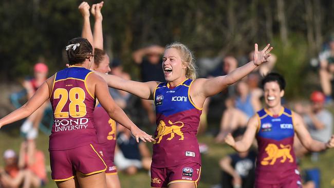 Brisbane players celebrate the win over GWS.