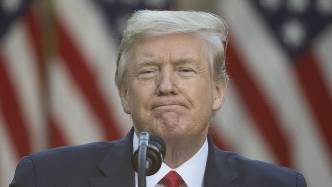 President Donald Trump pauses while speaking about the coronavirus in the Rose Garden of the White House on Monday. Picture: Alex Brandon/AP