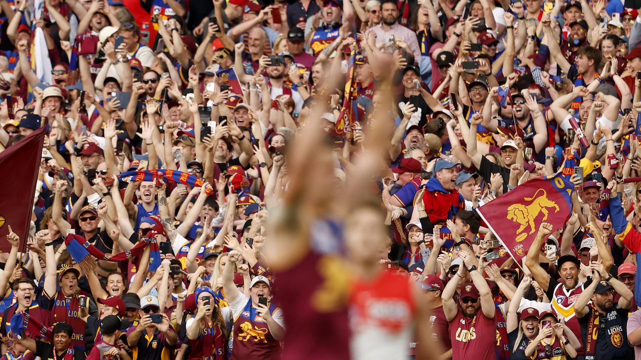 Brisbane fans celebrate on the siren during the 2024 AFL Grand Final between the Sydney Swans and Brisbane Lions at the MCG. Picture: Phil Hillyard