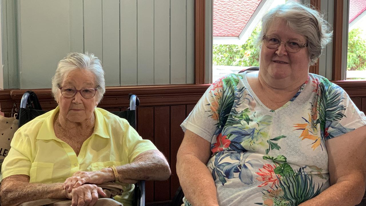 Catherine Denman (left) and Betty Porter sit together at the front of St Paul’s Uniting Church on Saturday. Picture: Duncan Evans