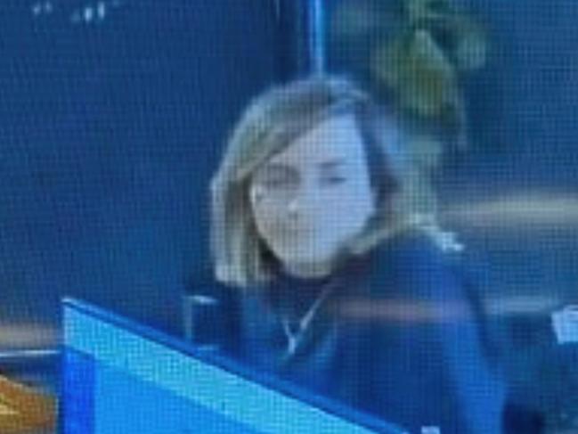 CCTV footage of Samantha Alampi checking into the Diplomat Hotel in Alice Springs on Thursday. Samantha Alampi - who manages the paroles of serious offenders for the North Australian Aboriginal Justice Agency - was allegedly found in an Alice Springs hotel room with killer Jefferson Woodie on early Sunday morning during a police raid. Picture: Supplied / The Australian