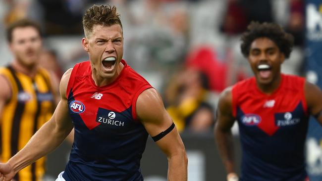 MELBOURNE, AUSTRALIA - APRIL 18: Jake Melksham of the Demons celebrates kicking a goal during the round five AFL match between the Hawthorn Hawks and the Melbourne Demons at Melbourne Cricket Ground on April 18, 2021 in Melbourne, Australia. (Photo by Quinn Rooney/Getty Images)