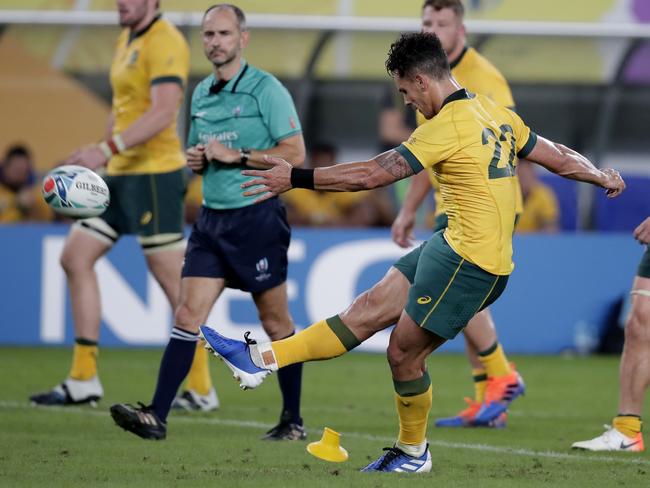 Matt Toomua kicks a penalty goal against Wales.