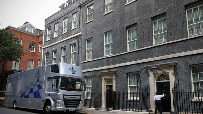 A removal van is pictured in Downing Street, the official residence of Britain's Prime Minister, as Boris Johnson prepares to step down next week.