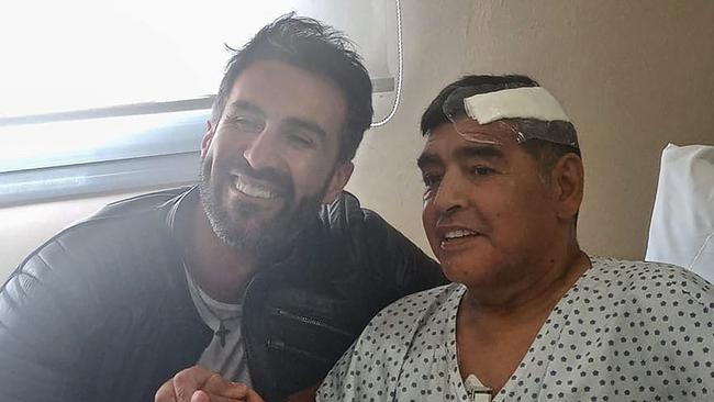 Doctor Leopoldo Luque with Diego Maradona two weeks before the footballer’s death. Conflicting accounts of what happened on the morning of the star’s death are at the centre of the investigation. Picture: AFP