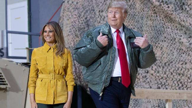 Donald and Melania Trump at al-Asad base in Iraq on Boxing Day. Picture: AFP.