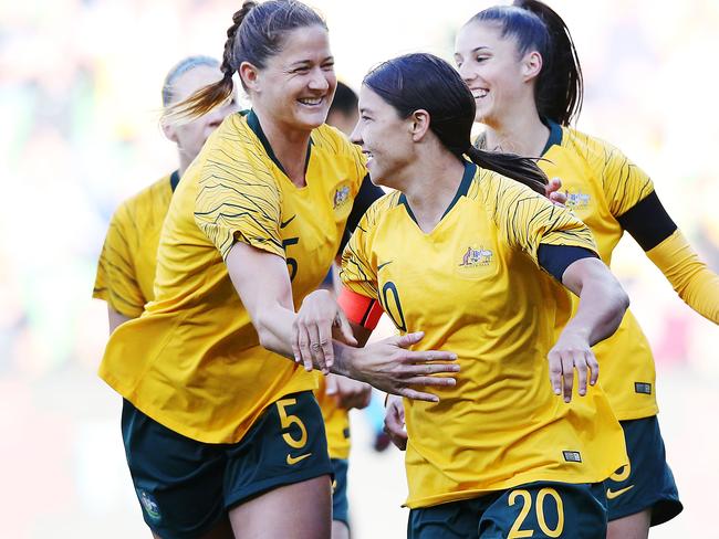 Here we go: Sam Kerr celebrates a goal with Laura Alleway (left). 