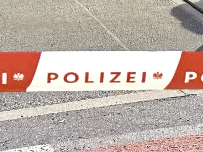 Officers of the Austrian State Criminal Police are seen near a police cordon after a knife attack near the main square in the city centre of Villach, southern Austria on February 15, 2025. A 14-year-old boy died and four other people were injured in the knife attack in southern Austria on February 15, police said, adding they have arrested a 23-year-old Syrian asylum seeker. (Photo by GERD EGGENBERGER / APA / AFP) / Austria OUT