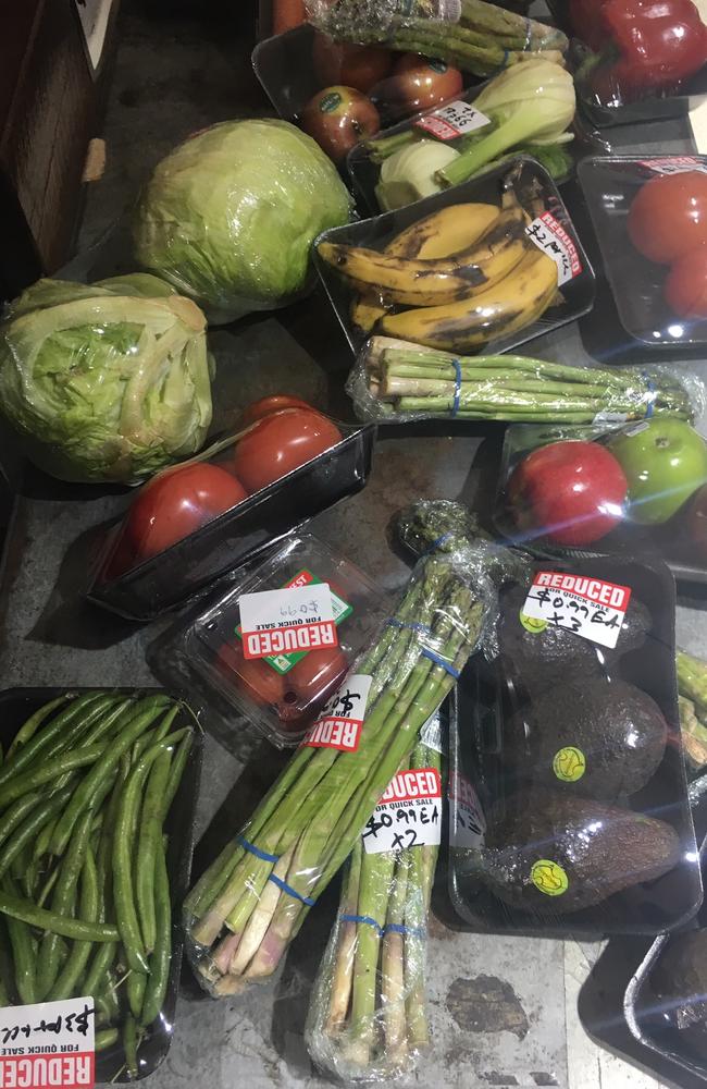 The reduced fruit and vegetables at IGA are similar, with everything from lettuce heads to bananas and avocados sealed in plastic.