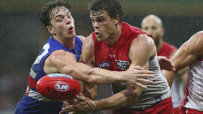 Liam Picken tackles Mike Pyke.