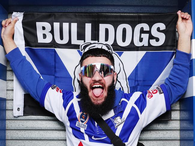 Embargoed for the weekend papers. The Daily telegraph 10.9.2024 Emilio Bounassif. Group of Canterbury Bulldogs fans outside Belmore Sports Ground. To go with a feature on the revival of the Bulldogs fan army.   Picture: Rohan Kelly