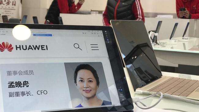 A profile of Huawei's chief financial officer Meng Wanzhou is displayed at a Huawei store in Beijing. Pic: AP