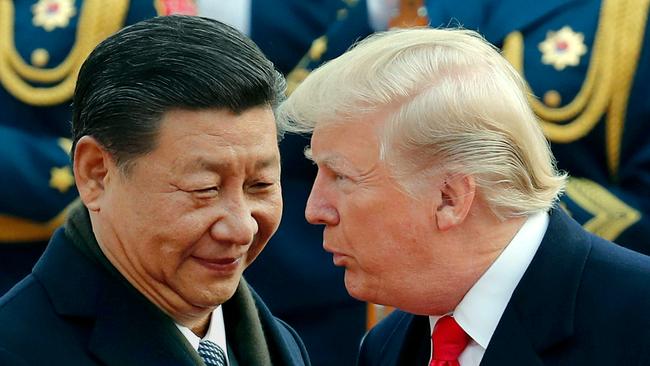 US President Donald Trump, right, with Chinese President Xi Jinping during a welcome ceremony at the Great Hall of the People in Beijing last year.