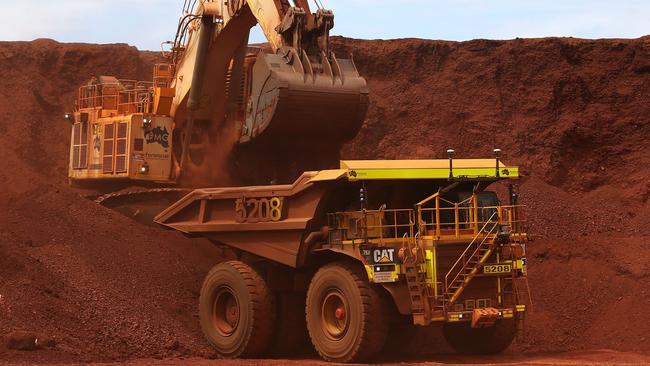 Iron ore exports are helping bring the budget back towards the black. Picture: Bloomberg