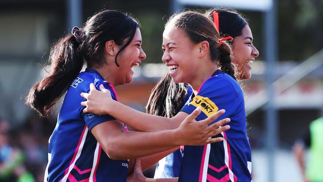 . Division One girls Keebra Park SHS v Mabel Park SHS. Mabel Highs Dreya Seumanutafa congratulated by Danielle Tutakangahau after try... Picture Glenn Hampson