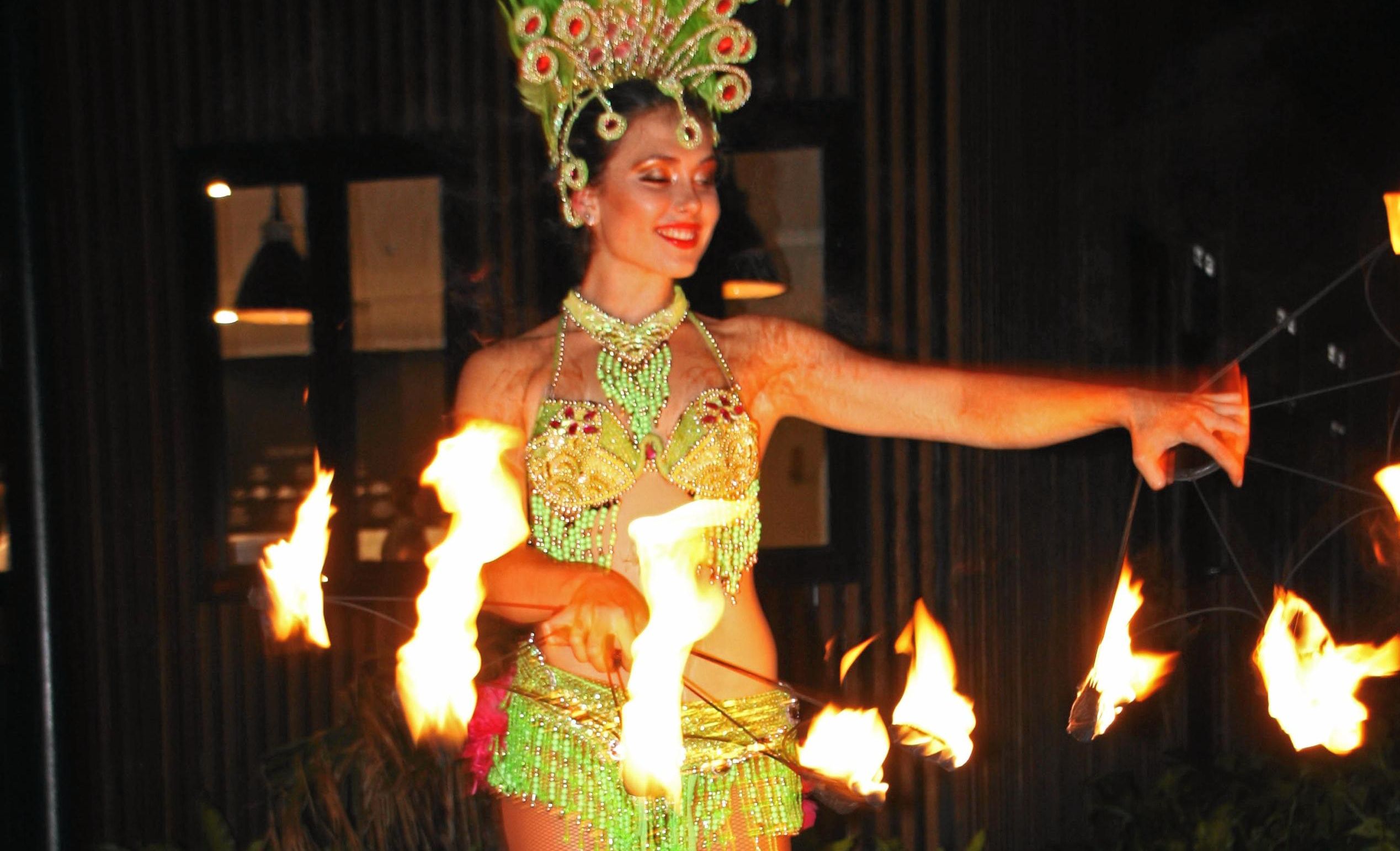 Fire dancer Sasha at AVID Property Group's launch of its new sales and information centre in Palmview's master-planned community of Harmony. Picture: Erle Levey