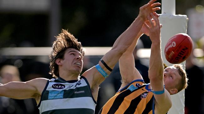 Old Geelong’s Nicholas Lucena and St Bernard's Dominic Sullivan battle it out on Saturday. Picture: Andy Brownbill