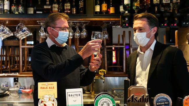 NSW ALP leader Chris Minns, right, with Craig Laundy in Rozelle. Picture: NCA Newswire /Gaye Gerard.