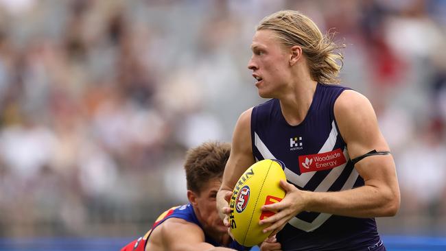 PERTH, AUSTRALIA – MARCH 17: Hayden Young of the Dockers in action during the round one AFL match between Fremantle Dockers and Brisbane Lions at Optus Stadium, on March 17, 2024, in Perth, Australia. (Photo by Paul Kane/Getty Images)