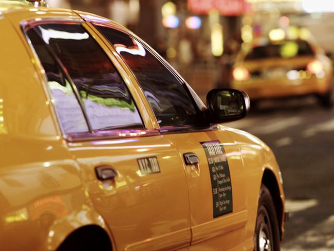 Taxis driving through times square in New York city