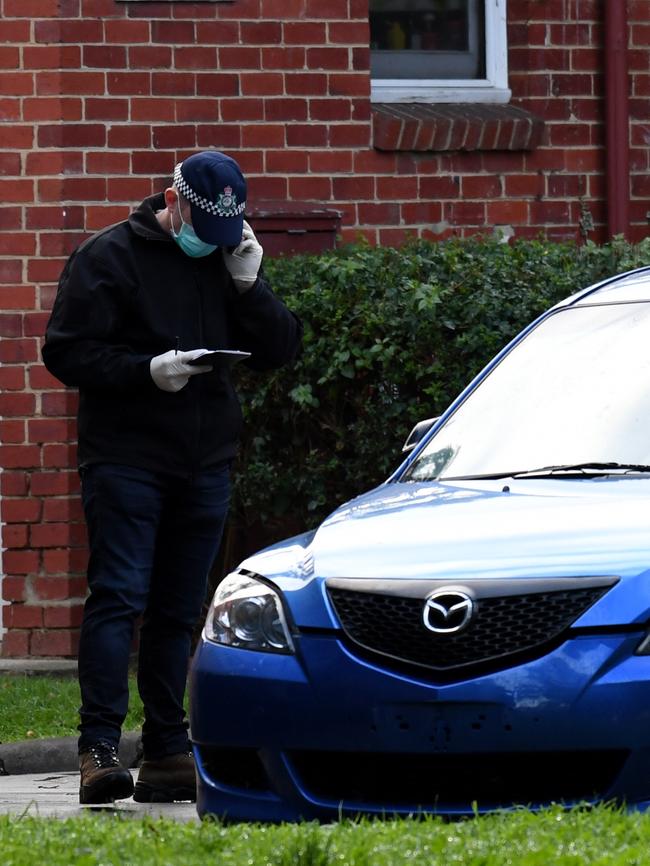 An AFP officer at Ascot Vale. Picture: Nicole Garmston