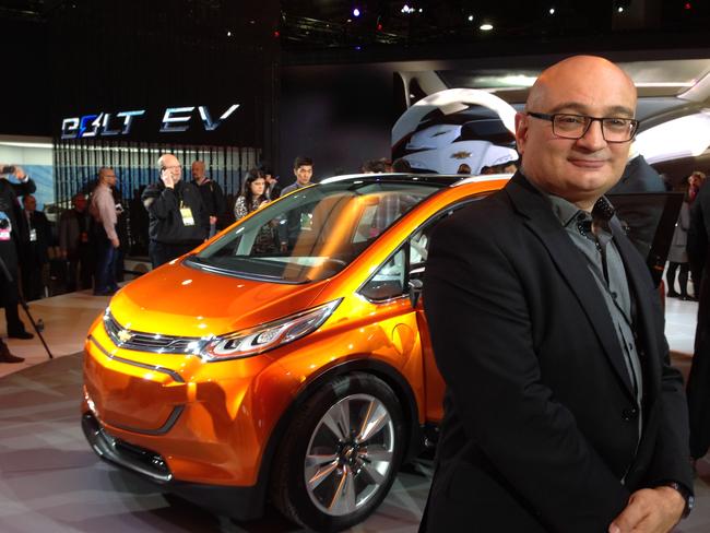 Proud ... Holden designer Richard Ferlazzo with the Chevrolet Bolt concept car in Detroit. Picture: Supplied