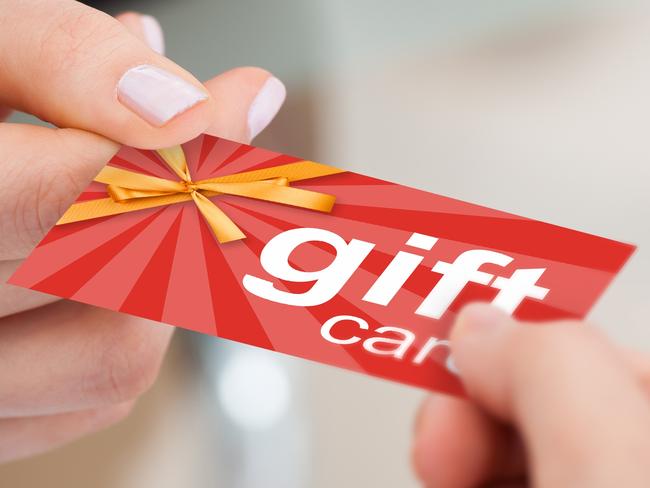 Woman using a gift card to pay. Picture: iStock.