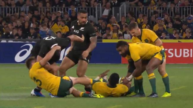 O'Connor continues to twist Lienert-Brown's neck as the Wallabies secure the ball.