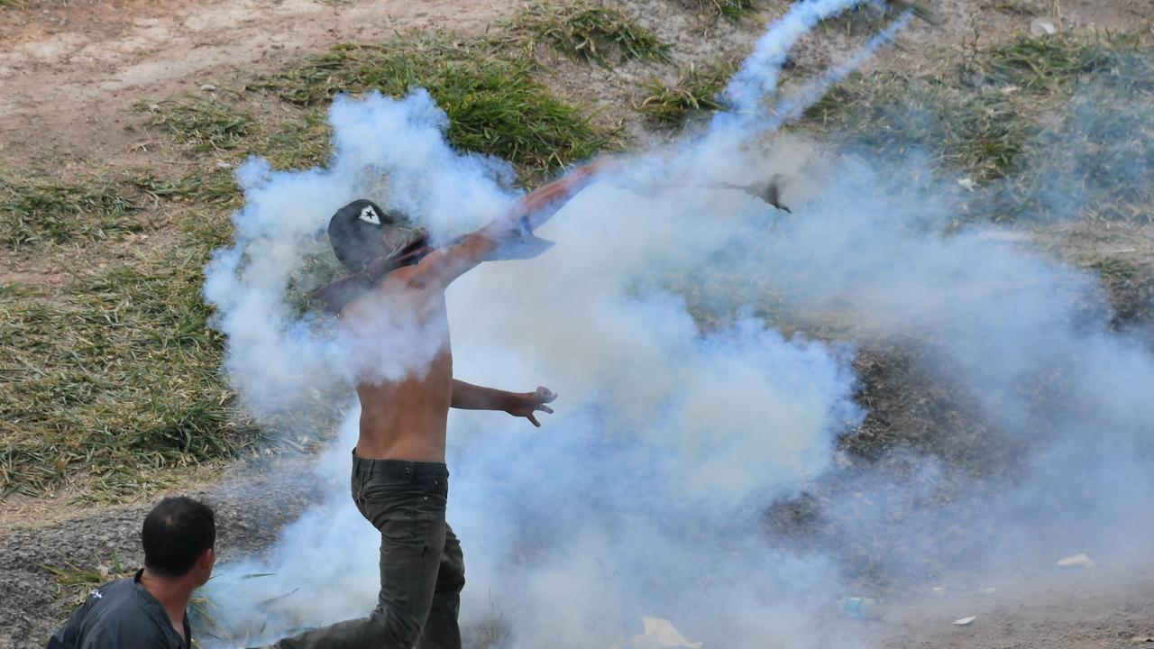 Two people died in clashes over the weekend between civilians and troops loyal to President Nicolas Maduro.