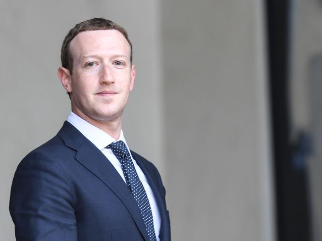 (FILES) In this file photo taken on May 23, 2018 Facebook's CEO Mark Zuckerberg leaves the Elysee presidential palace, in Paris,  following a meeting with French President on the day of the "Tech for Good" summit. - Facebook chief Mark Zuckerberg on November 15, 2018 sought to quell a new firestorm over the social network's handling of Russian misinformation efforts in 2016 and its hiring of a consulting firm that used questionable tactics to target the company's critics.Speaking on a conference call on content moderation efforts, Zuckerberg repeated his comments that Facebook was slow to spot Russian interference in the 2016 election but argued that "to suggest we weren't interested in knowing the truth or that we wanted to hide what we knew or stop investigations is simply untrue." (Photo by Alain JOCARD / AFP)