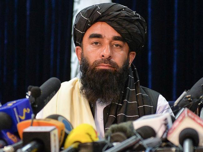 Taliban spokesperson Zabihullah Mujahid looks on as he addresses the first press conference in Kabul. Picture: AFP