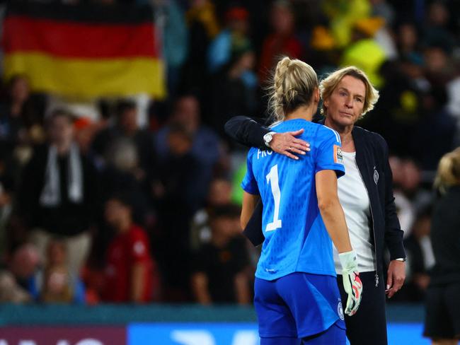 Germany's coach Martina Voss-Tecklenburg and goalkeeper Merle Frohms. Picture: Patrick Hamilton / AFP.