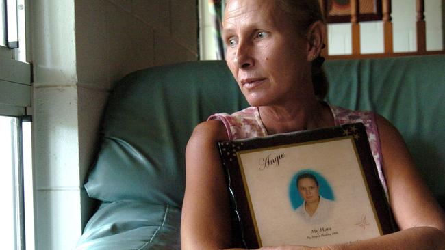 The late Jackie Shadforth holding a photo of her daughter Angela Mealing.