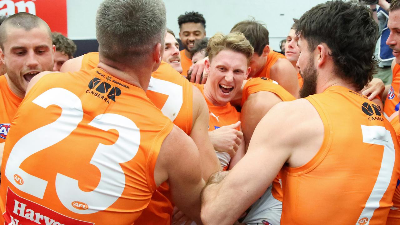 GWS players get around Lachie Whitfield after the win. Picture: James Worsfold/AFL Photos/via Getty Images