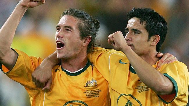 Harry Kewell and Tim Cahill after the Socceroos defeated Uruguay in 2005. Picture: Getty Images